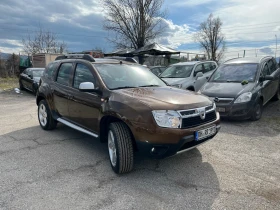 Dacia Duster 1.6 16V ГАЗ/БЕНЗИН, снимка 3 - Автомобили и джипове - 53478846