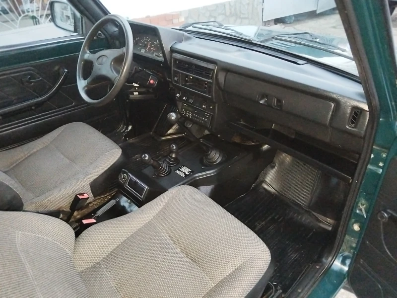 Lada Niva 1.7i, снимка 14 - Автомобили и джипове - 48417799