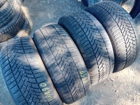 Гуми Зимни 215/55R17, снимка 1 - Гуми и джанти - 46754371